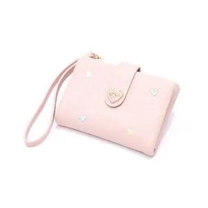 Detailed view of pink heart embroidered wallet with stylish heart-shaped metal buckle
