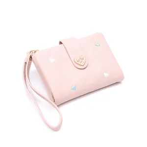 Soft pink ladies' short folding leather wallet featuring heart buckle and colorful embroidery