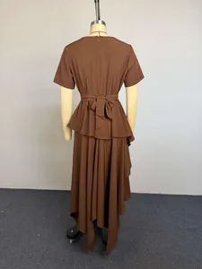 Detailed back view of a brown asymmetrical maxi dress with high waist bow tie