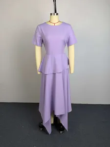 Elegant lavender short sleeve peplum dress featuring a stylish asymmetrical hem on mannequin