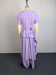 Back view of lavender asymmetrical ruffled dress with a high-waist bow-tie design