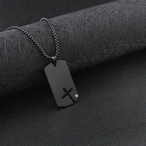 Black stainless steel dog tag necklace for men featuring a stylish hollow cross pendant