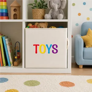 Detail of 4-inch vinyl alphabet stickers spelling TOYS on a beige storage bin