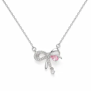 Elegante collana a fiocco in argento con gemma rosa a goccia e nappa di cristallo