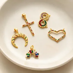 Detailed macro view of colorful zircon inlaid 18K gold plated jewelry pendants.