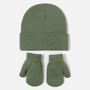 A cozy sage green knitted baby beanie and mitten set perfect for autumn and winter warmth.