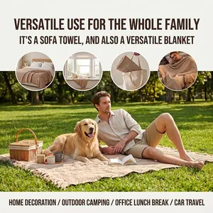 Lifestyle view of waffle weave blanket used as a picnic mat in a sunny park with dog.