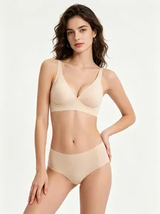 Detailed view of seamless nude jelly bra and panty set on model with soft support