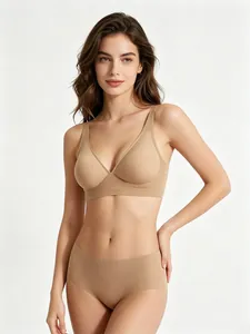 Elegant seamless nude-colored jelly glue bra and brief set shown on a female model