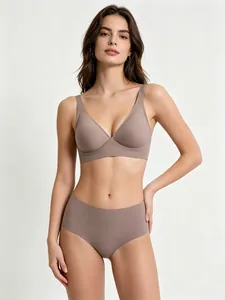 Seamless brown jelly bra and panty set worn by model in professional studio view