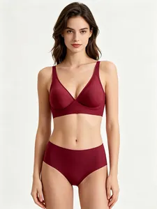 Detailed studio shot of a maroon seamless wire-free jelly bra and panty set on a model