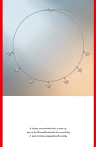 Detail view of a 925 sterling silver star necklace with sparkling moissanite stones
