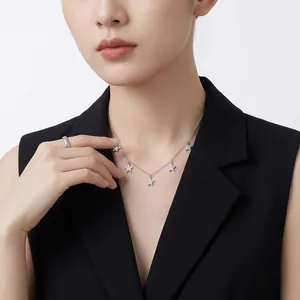 Elegant S925 silver clavicle necklace with five sparkling star pendants on model