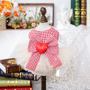 Red and white checkered pet princess dress with large bow and heart detail