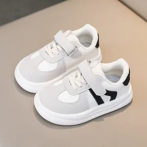 Toddler white and grey non-slip sneakers with soft sole and hook-and-loop strap