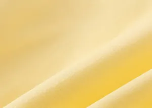 Macro di tessuto a pieghe giallo morbido di qualità per set estivo da bambina