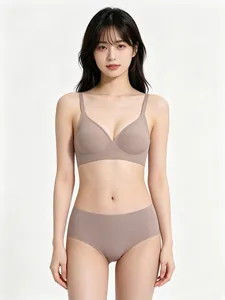 Soft beige seamless wireless jelly bra and panty set shown on a professional model