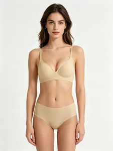Front view of seamless beige lingerie set showing the push-up effect and smooth texture