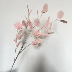 Detailed macro view of pink artificial eucalyptus leaves with realistic silk-screened texture