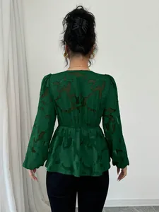 Back view of elegant dark green semi-transparent long sleeve blouse with floral burnout pattern