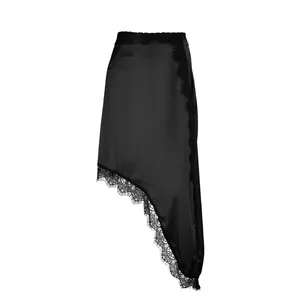 Detailed view of asymmetric black satin skirt with delicate lace trim