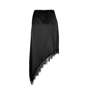 Close-up of elegant black satin midi skirt with asymmetric lace hem detail for women.