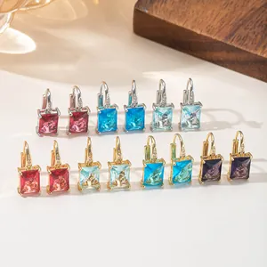 Collection of vintage square zircon earrings in various vibrant colors and metal finishes
