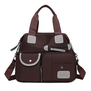 Multi-pocket oxford cloth travel handbag with large capacity in dark brown