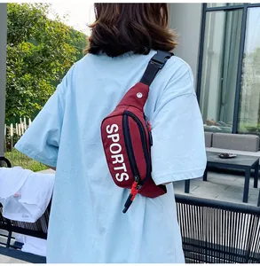 Back view of a maroon sports printed chest bag worn over a light blue t-shirt