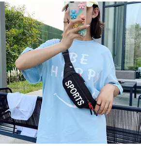 Close-up view of black waist bag with white SPORTS letter print worn by a model
