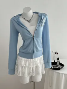 Premium light blue women's zip-up hoodie sweatshirt featuring a stylish graphic print