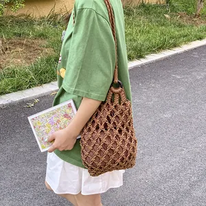 Vintage brown macrame woven hollow tote bag with a functional drawstring inner lining