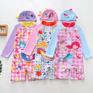 Detailed view of girls' one-piece swimsuits with cute cartoon mermaid and animal prints