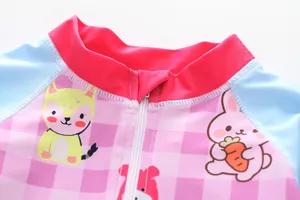 Close-up of cute cartoon children's one-piece swimsuit featuring front zipper detail