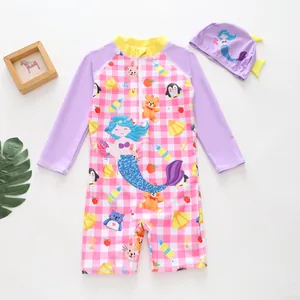 Cute cartoon girls' one-piece swimsuit with mermaid print and matching purple swim cap
