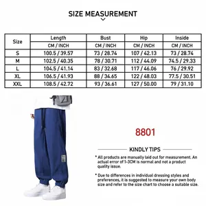 Detail view of blue corduroy cargo pants with a comprehensive size chart table.