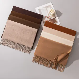 Premium solid color wool scarves with tassel trim in warm earth tones for winter warmth