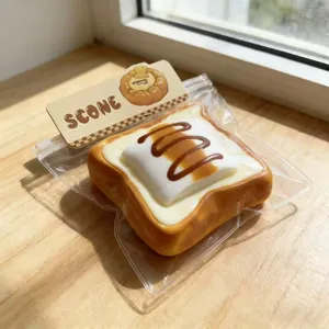 Realistic toasted bread squishy toy with marshmallow and chocolate sauce topping