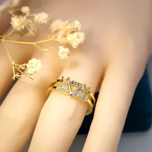Elegant luxury gold plated V letter open ring with shimmering zircon inlays for women.