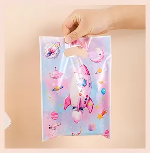 Macro view of space-themed rocket print plastic gift bag for kids party packaging