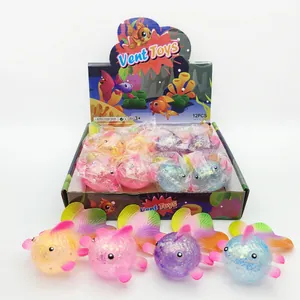 Vibrant colorful goldfish stress relief squishy toys displayed in original retail box.