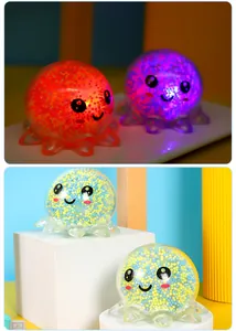Close-up of glowing octopus squishy toys with colorful foam beads and LED light