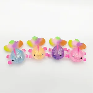 Set of four colorful goldfish squeeze toys for stress relief and slow rebound.