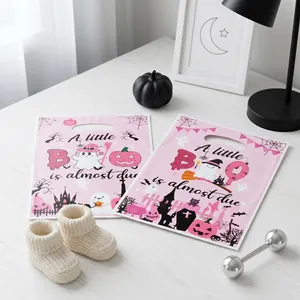 Pink Halloween baby shower gift bags featuring ghost and pumpkin with decorative text