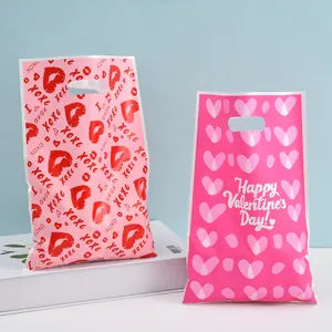 Valentine's Day plastic gift bags with pink heart and lip patterns for candy packaging