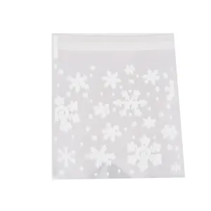 Transparent OPP self-adhesive bag with white snowflake pattern for cookie packaging