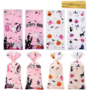 Halloween ghost and pumpkin printed candy bags with gold twist ties for party favors