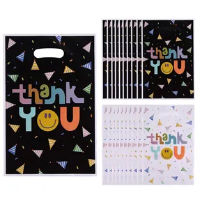 Set of assorted Thank You gift bags with smiley face and colorful confetti print pattern