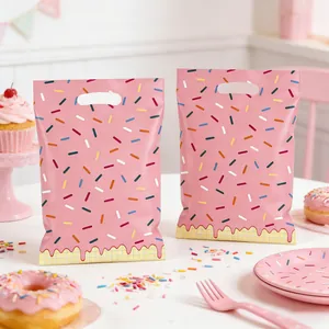 Pink doughnut print gift bags with die-cut handles for kids birthday party candy favors