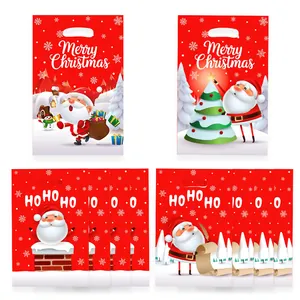 Lote de 4 bolsas de caramelos de Navidad con dibujos de Papá Noel y asas troqueladas